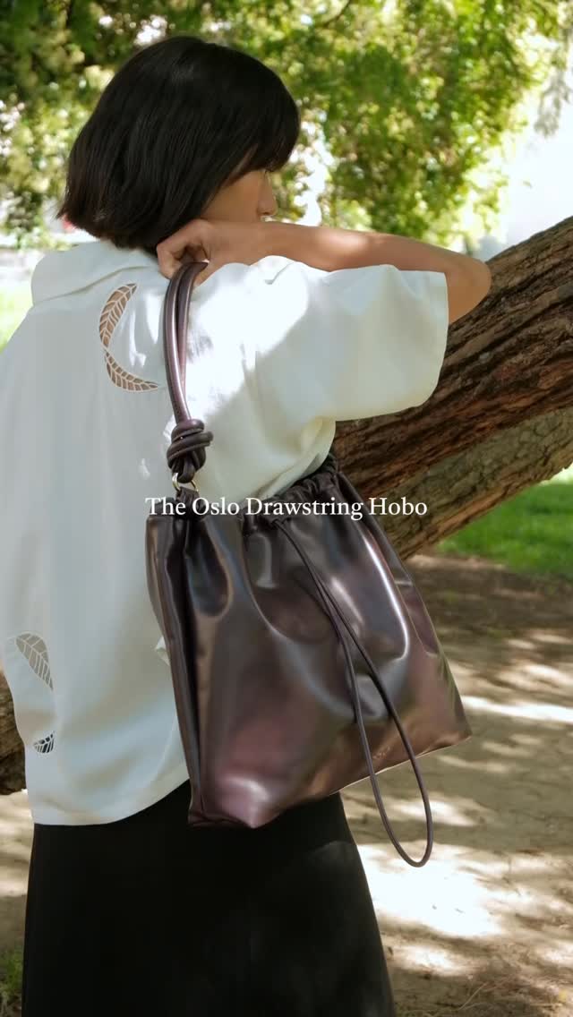 Need a bag that takes you from work to travel to semi-formal events? The Oslo Drawstring Hobo, our roomy new bag crafted from Apple leather, is made to hold all of life’s essentials and more.