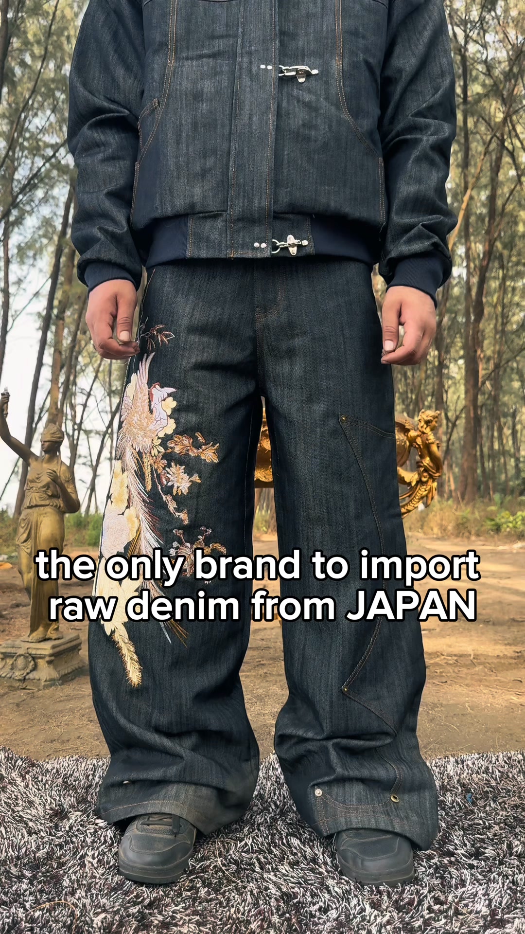 Folk Japanese Denim — a study in patience, texture, and precision.

Folk floral artwork embroidered across raw Japanese denim, balancing delicacy with structure. A quiet statement built through detail, not noise.

– 600,000 embroidery stitches in a mix of tatami, fill, and satin techniques.
– Denim imported from Japan, chosen for its depth and durability.
– Adjustable buckle belt at the back for a refined, custom fit.
– Sculpted panel construction flowing from back to front.
– Limited to 60 pieces worldwide.

Unisex fit.
The model is 5’10” wearing waist 30–32.