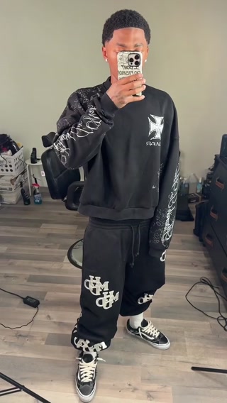 Discover the Black Leopard Crewneck from Flowar