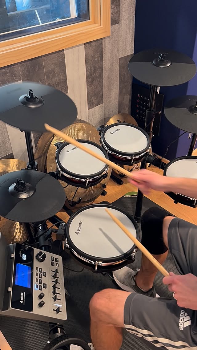 Donner DED-300X Electronic Drum Set

Built with a pro-level configuration including 5 dual zone drum pads + 4 cymbals for more natural feel and response. The sound module has 100 built-in drum kits, over 900 sounds, plus you can tweak individual drum/cymbal volumes and sound details. There is USB MIDI, a built-in mixer panel, and the module even has a slot for a tablet/phone so you can play-along with apps or tracks.