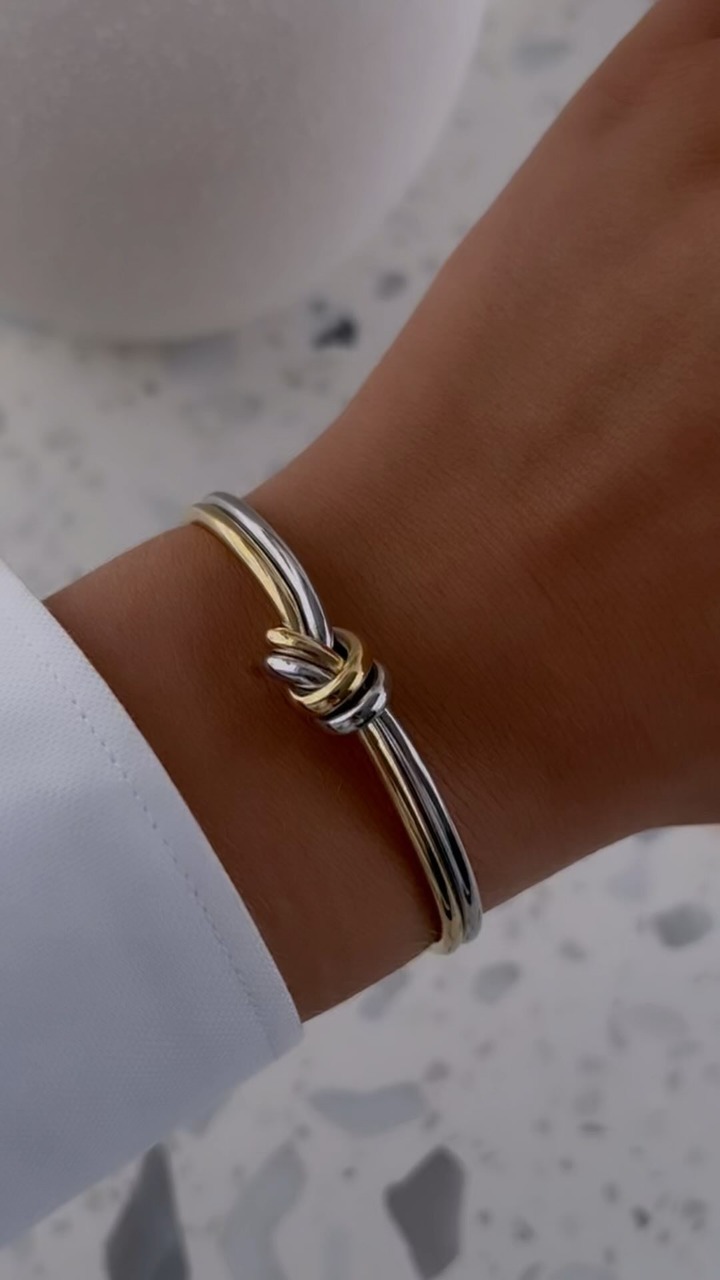 The new two-toned Dual Knot Bangle is selling out fast. Grab it now before someone else beats you to it! Exclusively sold at waldorandco.com