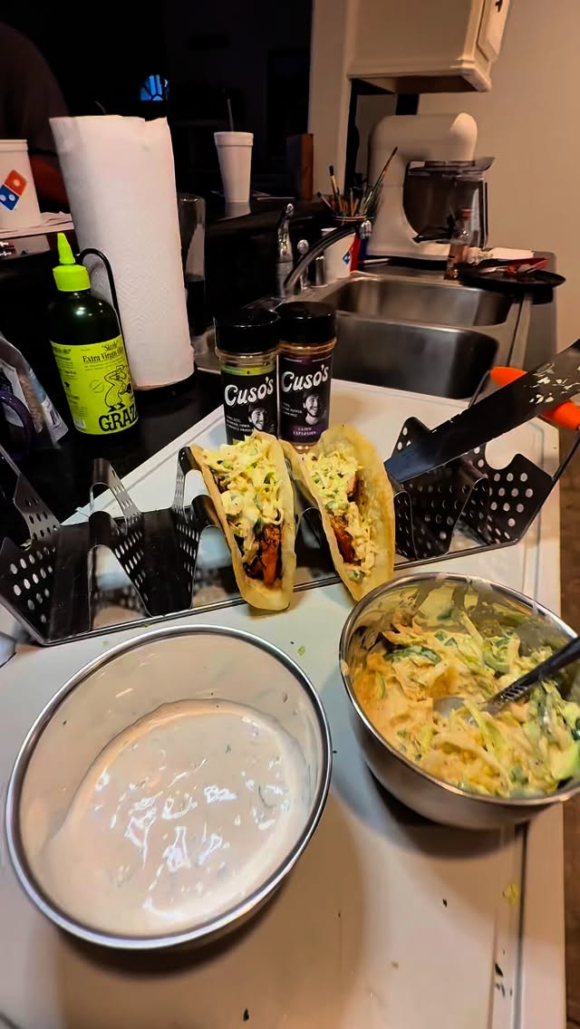 Cajun Coleslaw Shrimp Tacos with Lime Crema 🌮🔥

Ingredients:
 • Shrimp (peeled & deveined)
 • @getgraza olive oil
 • @cusos Cajun Explosion  and tequila lime habanero seasoning (use code youngsmokebbq for 10% off)
 • Sour cream (eyeball amount)
 • 1 lime (juiced)
 • Fresh cilantro (chopped)
 • Coleslaw mix (homemade or store-bought)
 • Tortillas
 • Butter

⸻

Instructions

1. Prep the Shrimp
 • Pat shrimp dry and place in a bowl.
 • Drizzle with Graza olive oil.
 • Season generously with Cusos Cajun Explosion.
 • Let marinate while you prep the crema and coleslaw.

2. Make the Lime Crema
 • Add sour cream to a small bowl (eyeball the amount needed).
 • Roll, cut, and squeeze fresh lime juice into the sour cream.
 • Stir in chopped cilantro.
 • Add a splash of Cusos Tequila Lime Habanero for heat.
 • Mix well, cover, and refrigerate.

3. Cajun Coleslaw
 • Toss your coleslaw mix with seasoning and dressing (video recipe coming soon 👀).
 • Chill until ready to serve.

4. Toast the Tortillas
 • Heat your @yeti cast iron skillet.
 • Toast tortillas until golden and slightly charred.
 • Place them on a taco rack to keep warm.

5. Cook the Shrimp
 • Add butter to the cast iron.
 • Cook shrimp about 1 minute per side — look for them to curl into a “C” shape (that’s when they’re perfect).

6. Build the Tacos
 • Place shrimp onto the toasted tortillas.
 • Top with Cajun coleslaw.
 • Drizzle with lime crema.

7. Serve & Enjoy
 • Perfect for family, friends, or your next cookout! 🌶️🌮✨